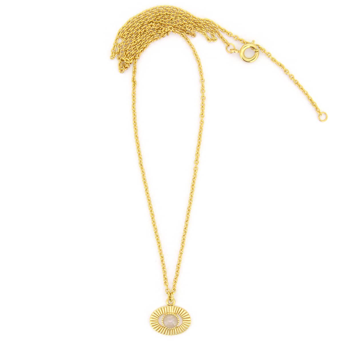 Elegant gold necklace featuring a round pendant with a stone in the center.