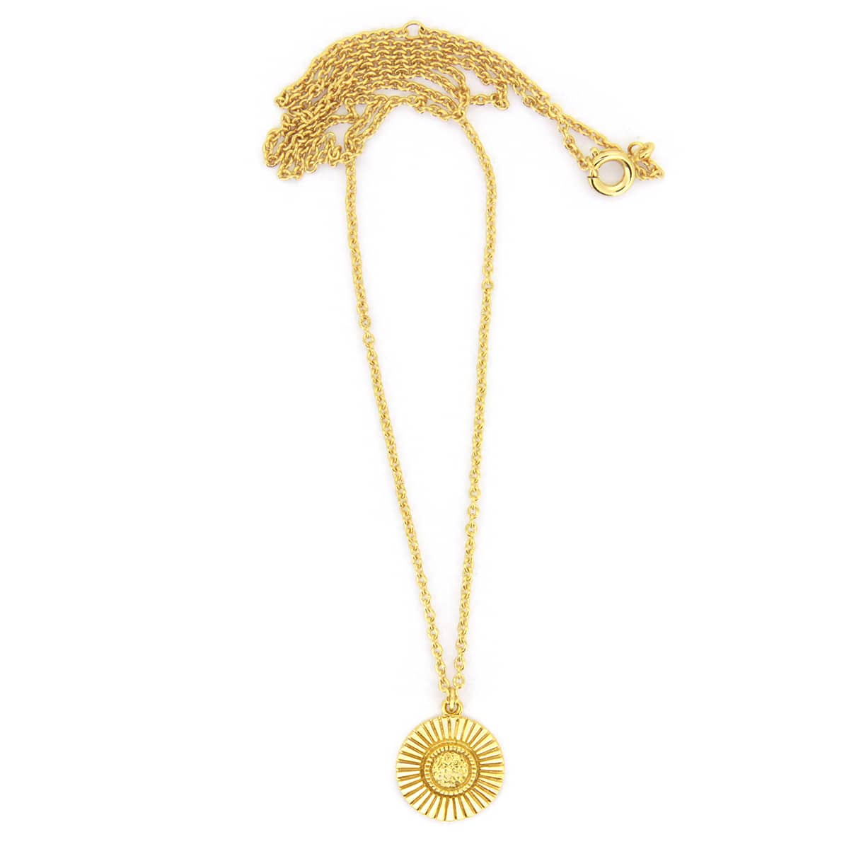 Beautiful gold necklace with a circular pendant with a moonshine design