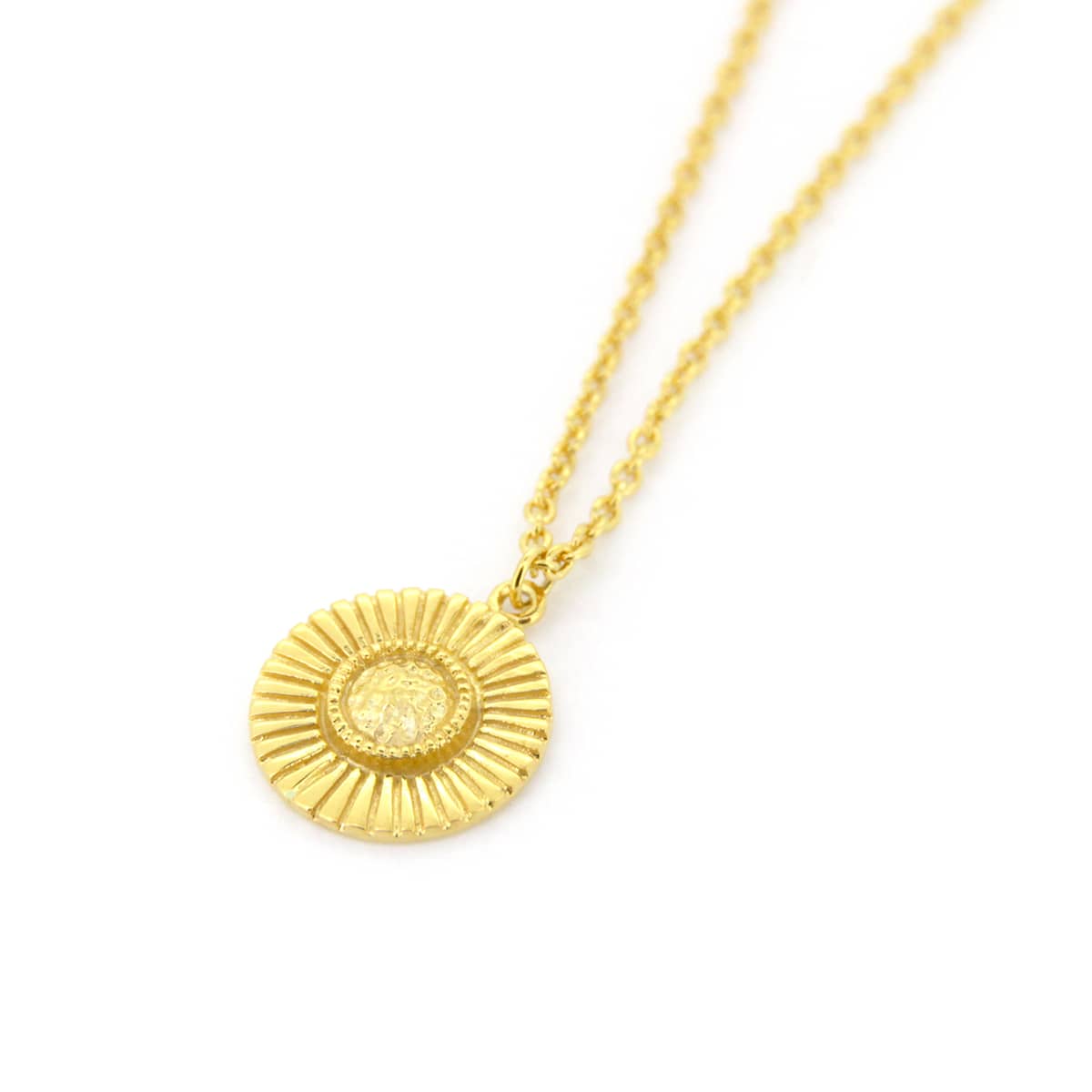 Beautiful gold necklace with a circular pendant with a moonshine design