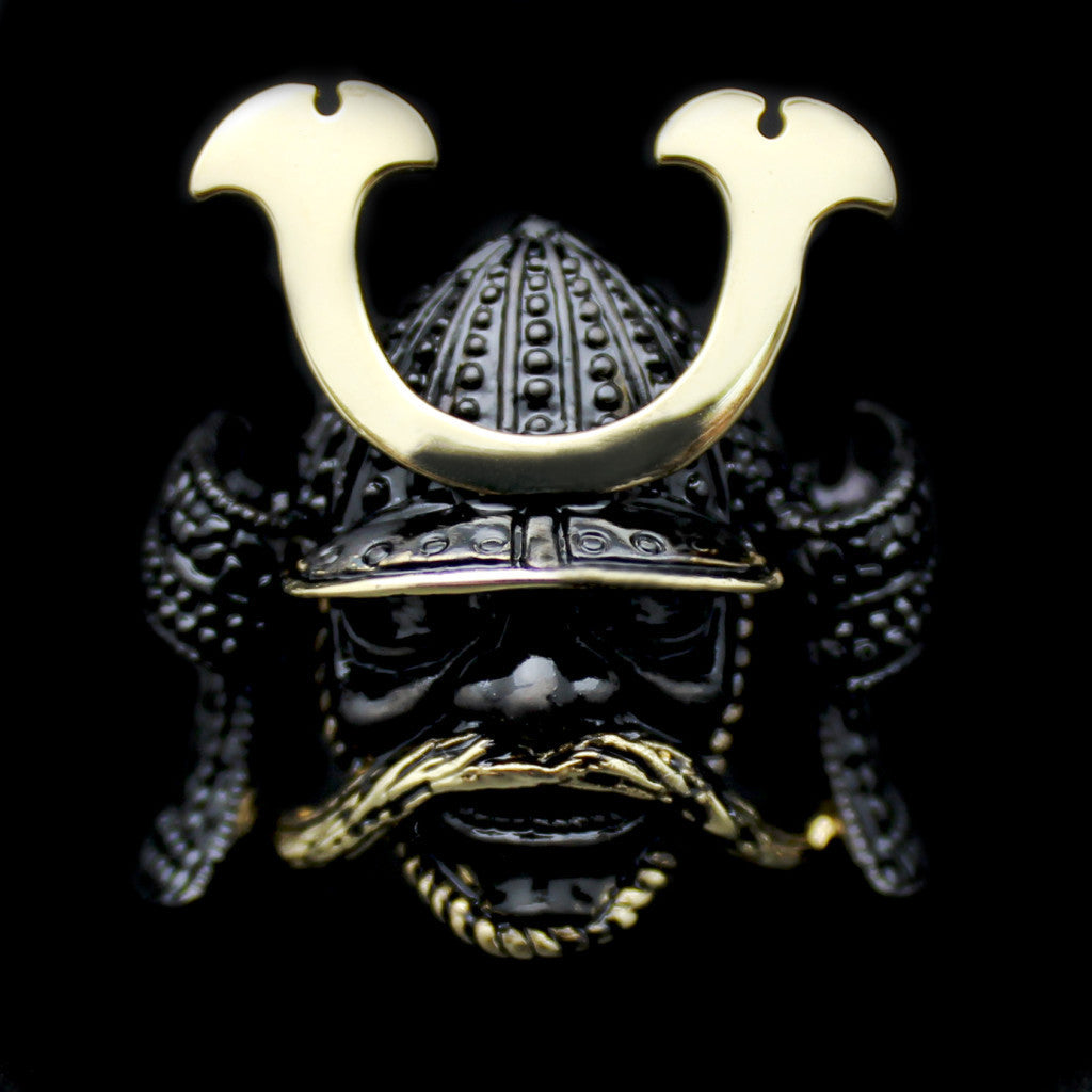 Beautifully crafted ring designed as a samurai helmet with intricate details and a gold-toned visor.