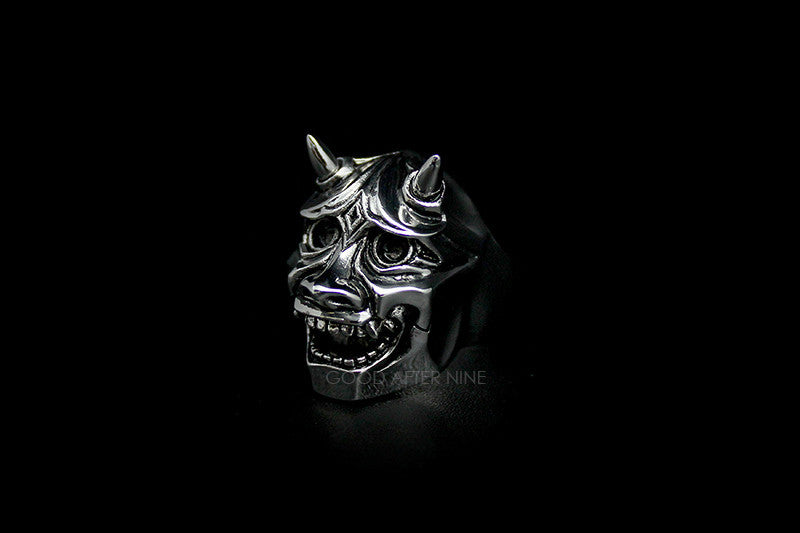 An artisan-crafted ring depicting a demon face, perfect for unique jewelry lovers.