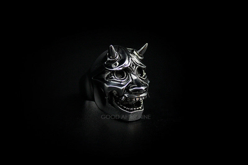 An artisan-crafted ring depicting a demon face, perfect for unique jewelry lovers.