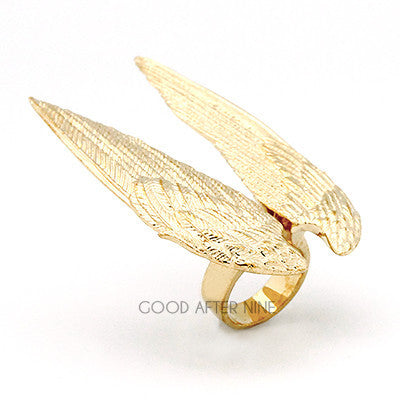 Artisan-crafted ring showcasing elegant wing shapes