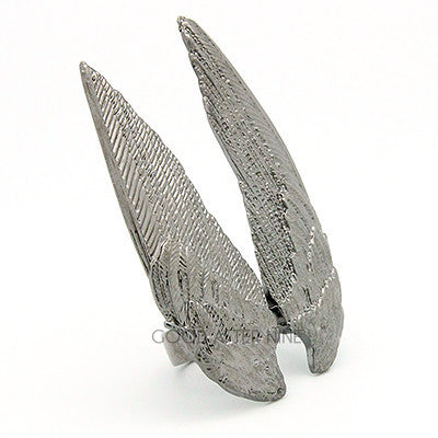 Unique winged ring design with intricate detailing