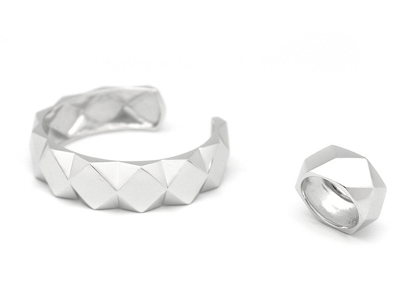 Minimalist silver accessories with a unique geometric design.