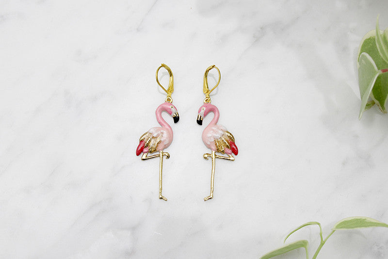 Stylish pink flamingo earrings perfect for summer fashion.