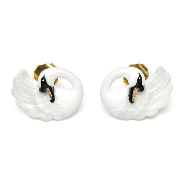 A pair of earrings featuring swan shapes in white with textured wings and black accents on the heads and beaks