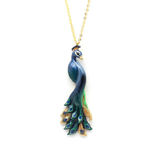 Charming peacock pendent necklace with intricate feather details on a gold chain, perfect for animal lovers.