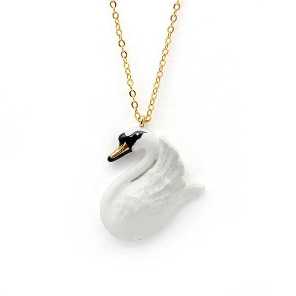 Handcrafted necklace with beautiful swan pendant in white with textured wings and delicate details.