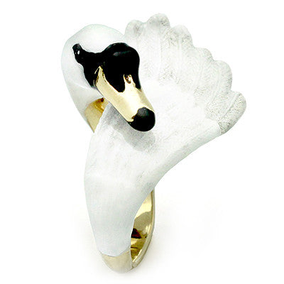 Handcrafted ring with a swan design, featuring a gold and black head with a white body, perfect for animal lovers.