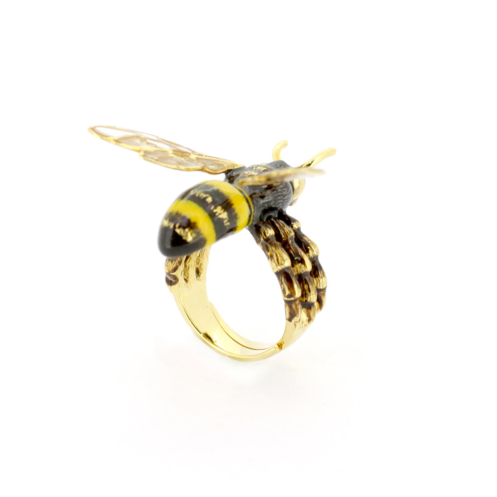 Handcrafted bee ring featuring a unique design with golden wings and black stripes.