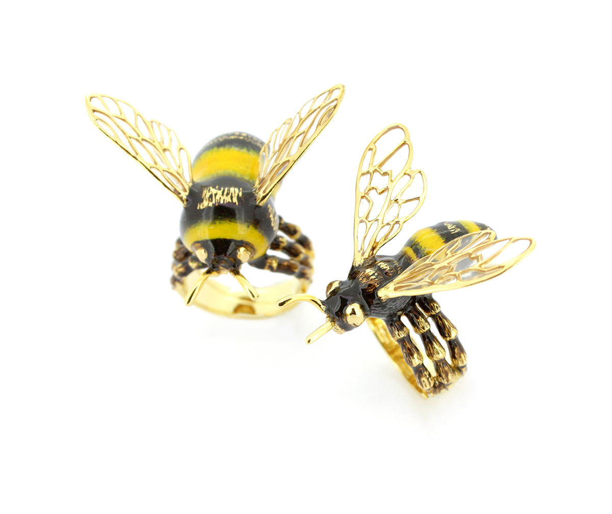 Nature-inspired bee rings showcasing intricate details and vibrant colors.