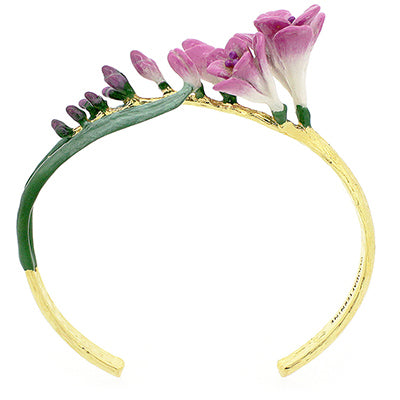 Handcrafted bangle with delicate pink flowers and green leaves.