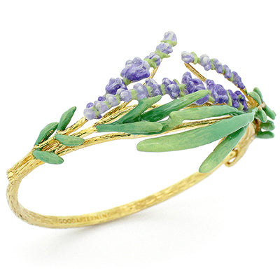 A gold bracelet adorned with green leaves and delicate purple flowers, perfect for flower lovers.