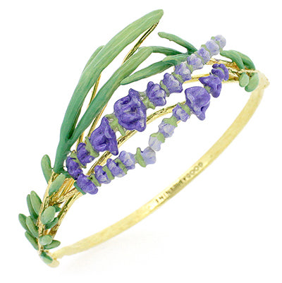 Beautiful floral bracelet adorned with green leaves and delicate purple flowers