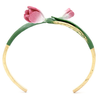 Beautiful floral bangle with pink tulip and green leaves designs, perfect for flower lovers.