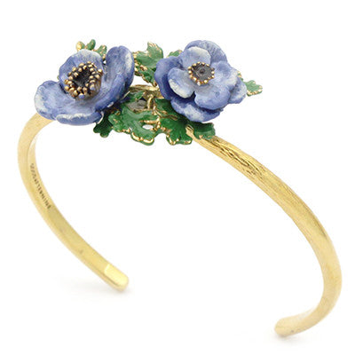 Bangle featuring intricate purple flowers and green leaves details.