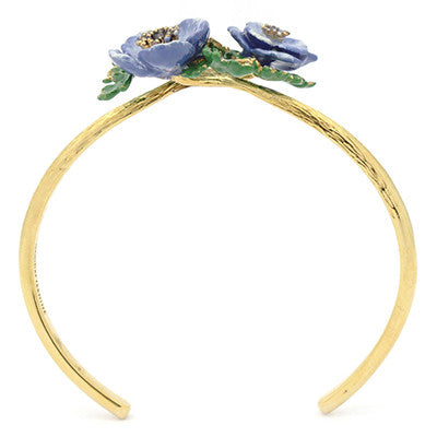 Bangle featuring intricate purple flowers and green leaves details.