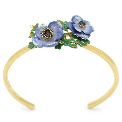 Nature-inspired bangle featuring purple flowers and green leaves.