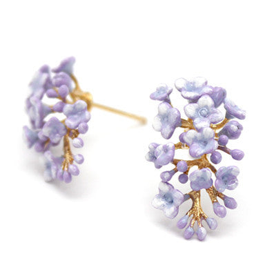 Purple floral earrings with delicate petals and gold accents, resembling a blooming branch, elegantly designed.