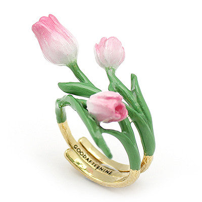 Beautiful pink tulip ring with gold band and green leaves.