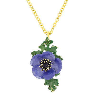 Nature-inspired necklace featuring a purple flower and green leaves. 