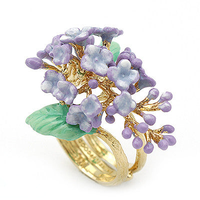 A gold ring featuring vibrant purple flowers and green leaves, perfect for flower lovers.