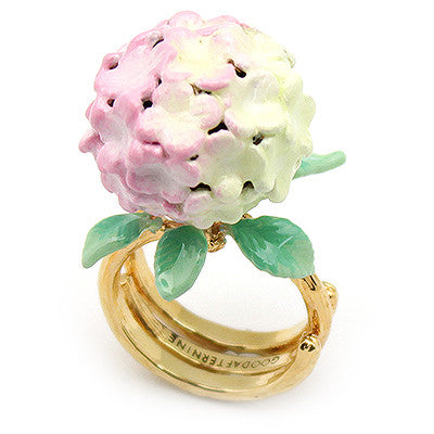 Handcrafted floral ring showcasing a beautiful soft pink hydrangea and green leaves.