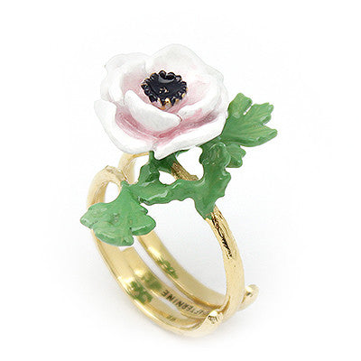 Botanical-themed ring with a stunning flower and leaf design.