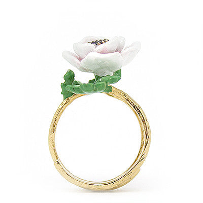 Artisan-crafted ring featuring a stunning flower design, perfect for nature lovers.