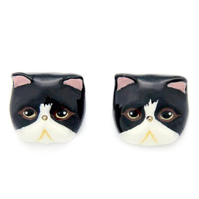 Unique ring showcasing a black and white cat's head, perfect for animal lovers.