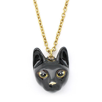 Charming gold necklace with black cat's head pendant, perfect for animal lovers.