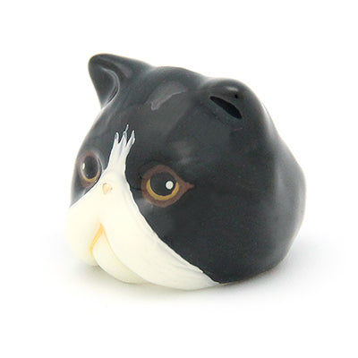 Cute black and white cat ring with detailed facial features.