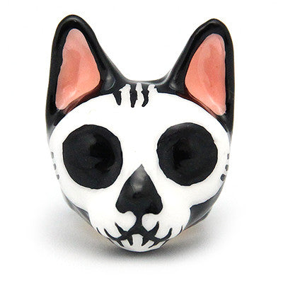 Artisan cat skull ring with black and white design and pink accents, perfect for cat lovers.