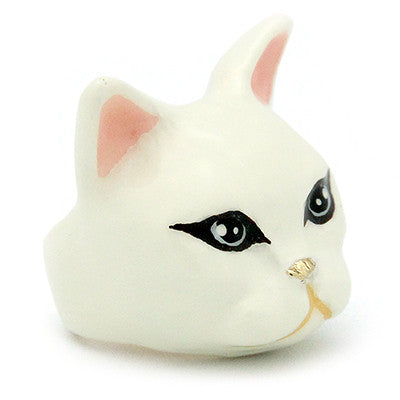 Handcrafted white cat ring with black eyes and pink ears, perfect for animal lovers.