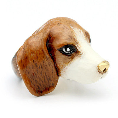 A handcrafted ring showcasing a Beagle dog design.