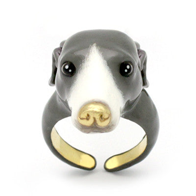 A dog's head ring featuring a grey and white color scheme with black eyes and a gold nose, perfect for dog lovers.