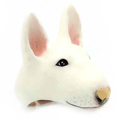 White bull terrier ring with a heart-shaped nose.