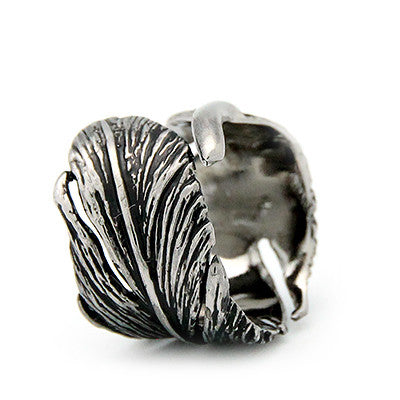 Handcrafted silver ring with a unique feather design