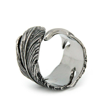 Handcrafted silver ring with a unique feather design