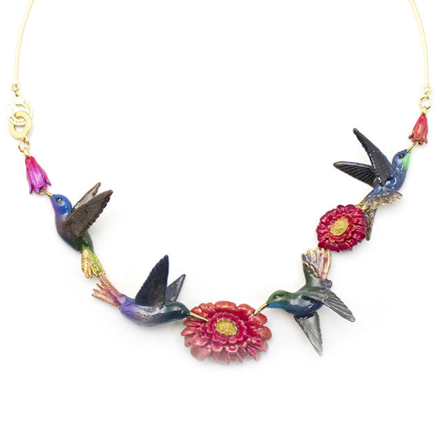 Handmade hummingbird and flower statement necklace with intricate details