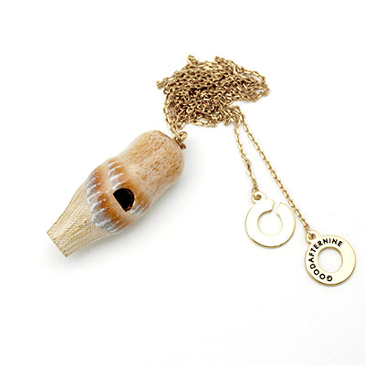 Whimsical owl-shaped whistle necklace with black eyes, and detailed feathers