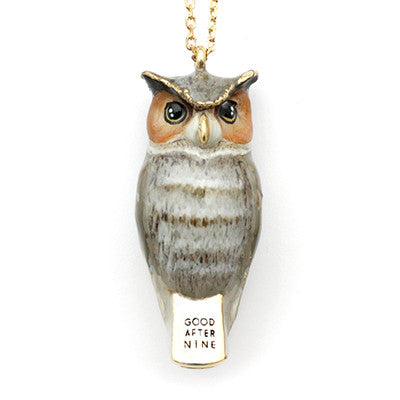 Whimsical owl-shaped whistle necklace with black eyes, and detailed feathers