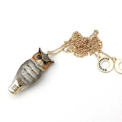 Whimsical owl-shaped whistle necklace with black eyes, and detailed feathers