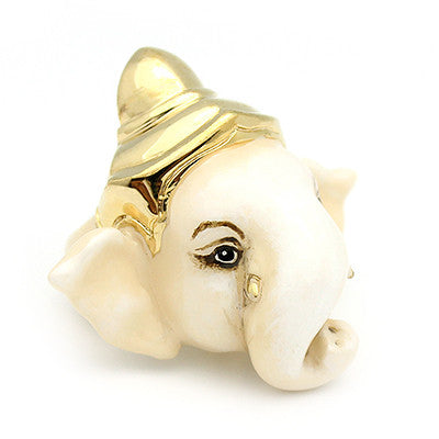 A stunning Ganesh ring adorned with a golden crown, featuring large elephant ears and expressive eyes, all crafted in white hues.