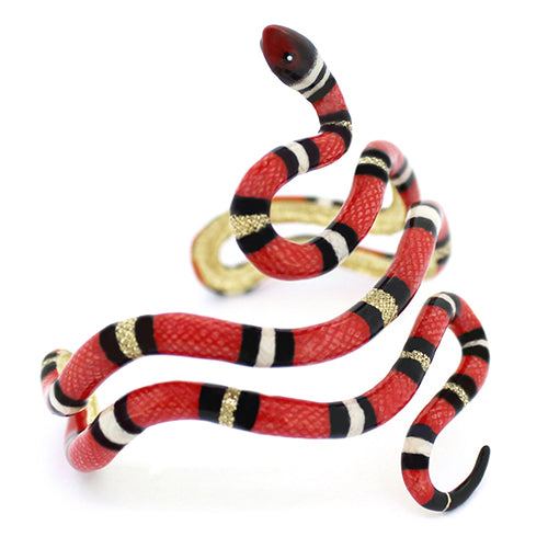 Nature-inspired bangle featuring a striking red milk snake with black and white stripes.