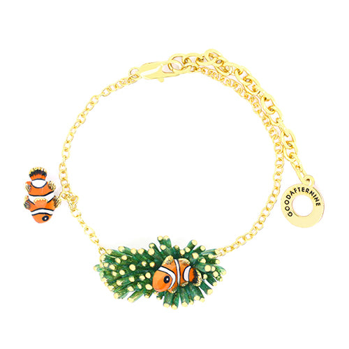 A handmade bracelet with charming clownfish charms and a unique coral design.