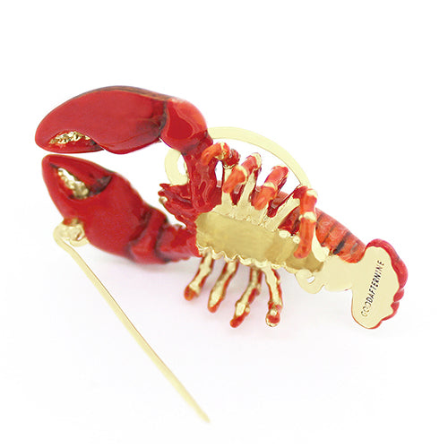 Nature-inspired brooch with a lobster design, featuring vibrant red colors and gold detailing.