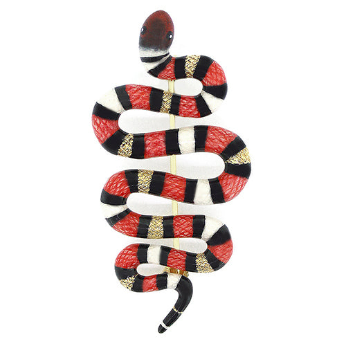 An eye-catching red milk snake brooch, featuring black and white stripes.