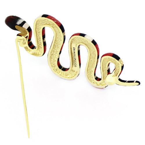 Handmade red milk snake brooch, featuring black and white stripes.